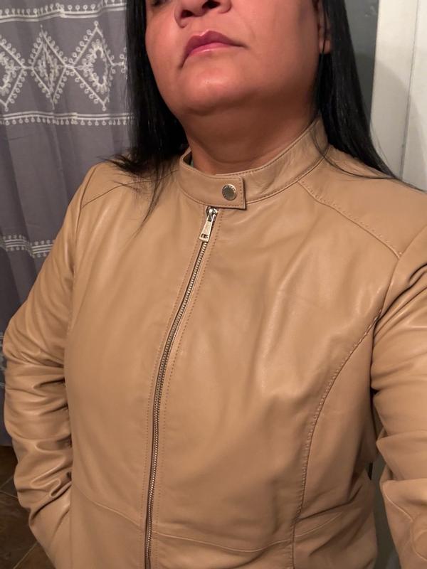 Customer photo for "Premium feel, quality lining and pockets, easy care, and true value — this Cole Haan jacket is worth the investment."