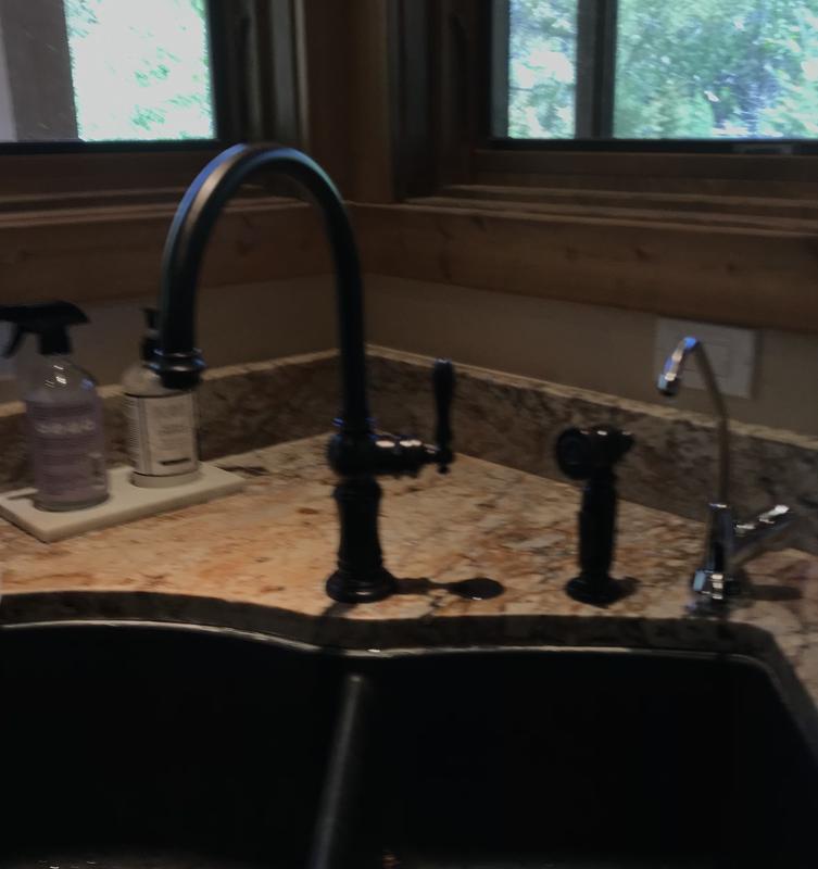 Two piece Kohler faucet, hole cover