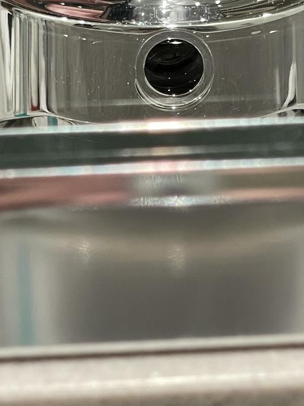 Don't drop the screw, it will be impossible to retrieve!