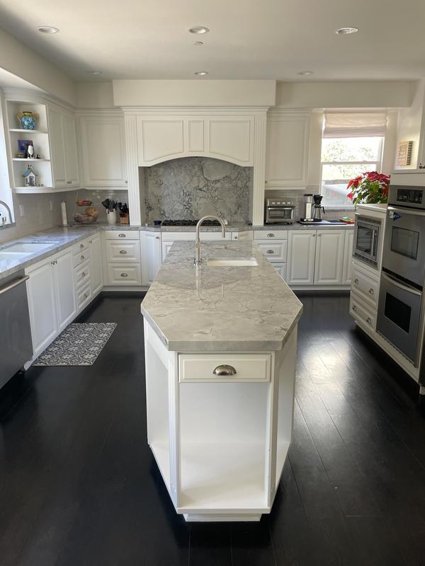 Great Kohler faucets and backsplash