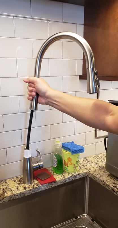 Faucet detaches by faucet lever