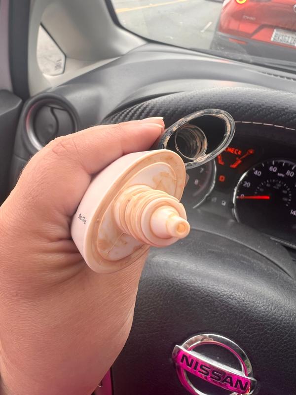 Customer photo for "Leaks! 60% of bottle gone in less than 2 weeks"