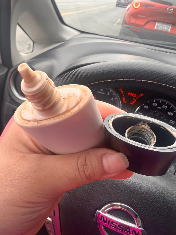 Customer photo for "Leaks! 60% of bottle gone in less than 2 weeks"