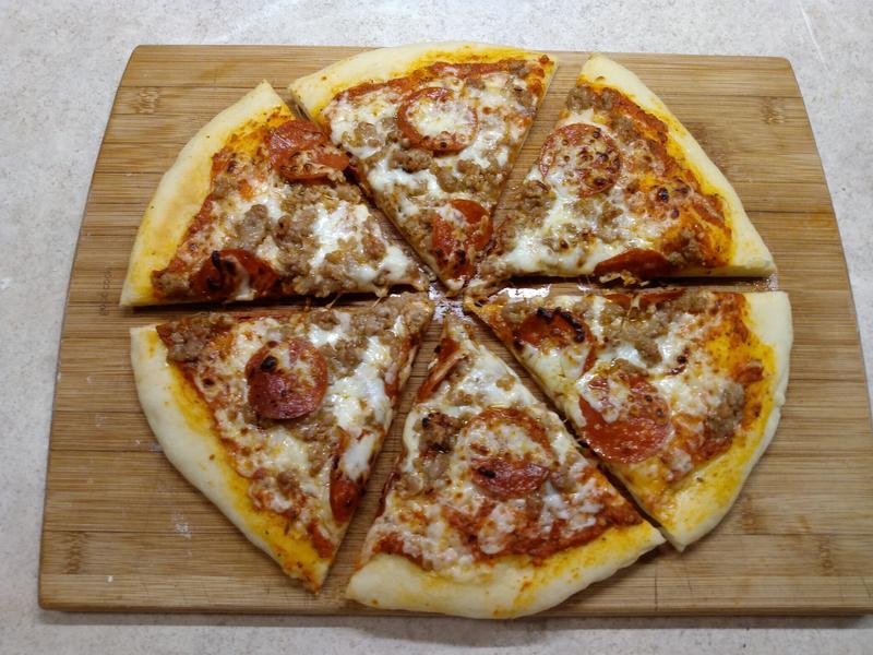 Pepperoni and sausage, 500* for about 5 minutes.