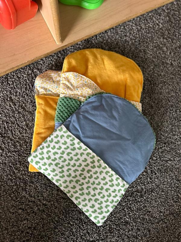 Customer photo for "Infants love the sound and texture of these bags"