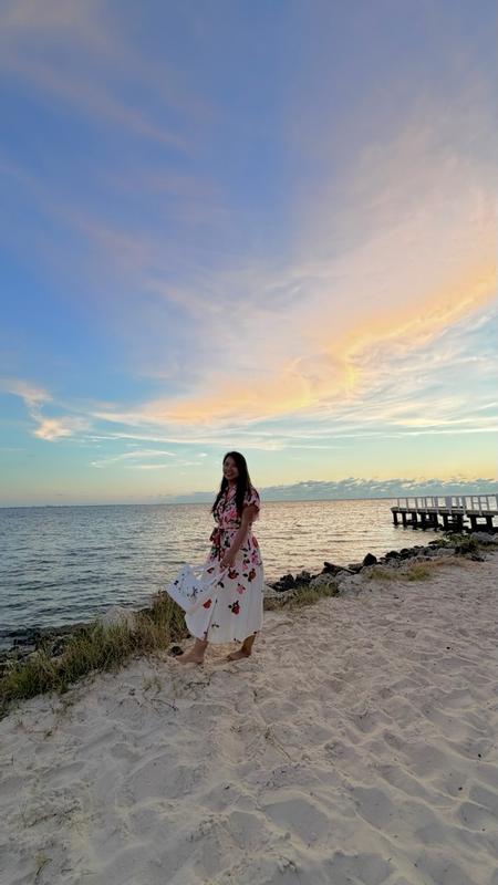 Customer photo for "Beautiful print and comfortable dress with a very flattering waistline."