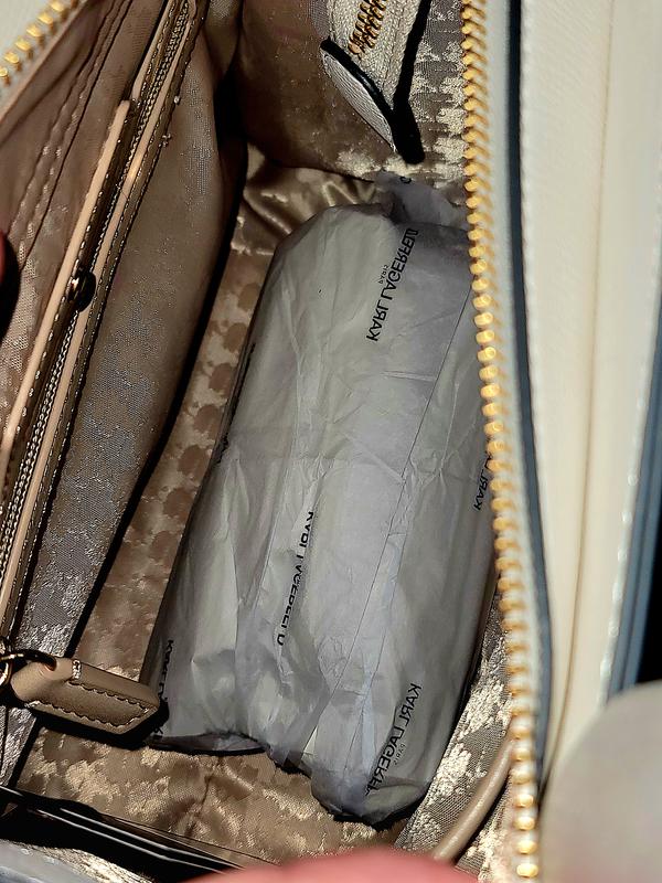 From the top, it can open wide enough to get items inside without bending or struggling, interior details are gorgeous!