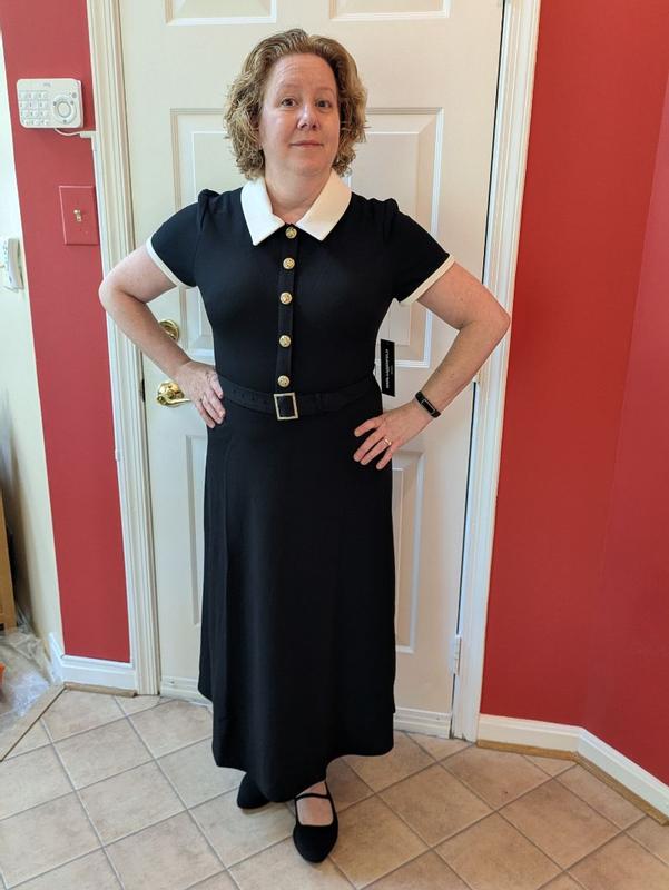 Customer photo for "Cute dress with possible sizing issue"