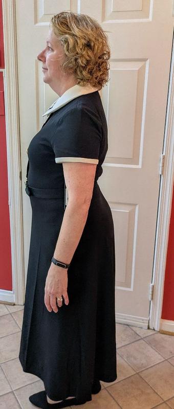 Customer photo for "Cute dress with possible sizing issue"