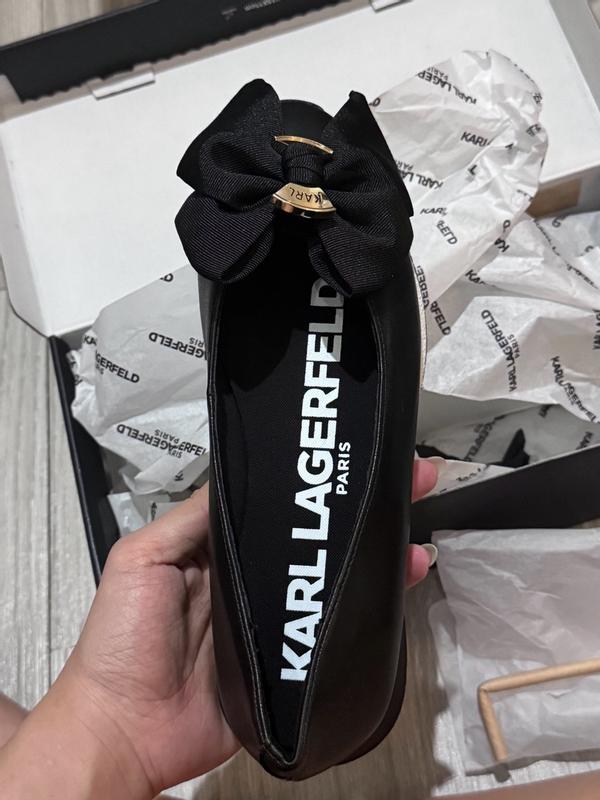 Customer photo for "Cute bow detail, lightweight material, easy slip-on design, sturdy construction, and no strong smell."