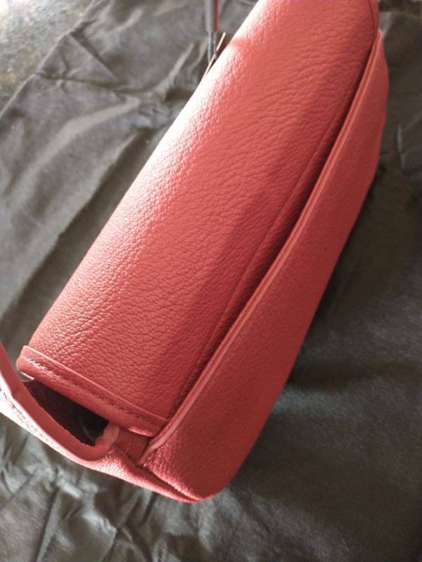 pocket in back of purse