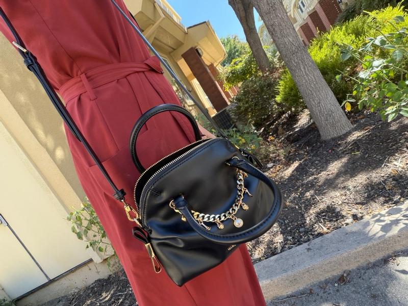 Customer photo for "Great little stylish bag. Gives any outfit a little stylish boost"