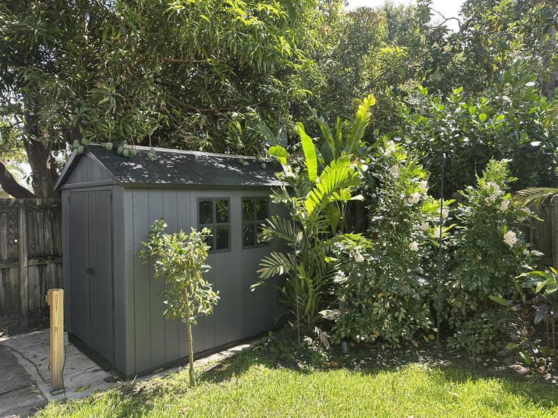 7.5’ x 9’ Newton Plus storage shed fitting perfectly on a previously laid slab in our backyard at “Mango Manor” in Oakland Park, FL!