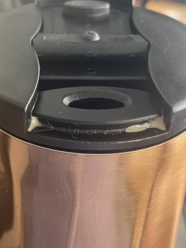 Pull tab up for drinking and the hole the coffee comes out drips when sipping