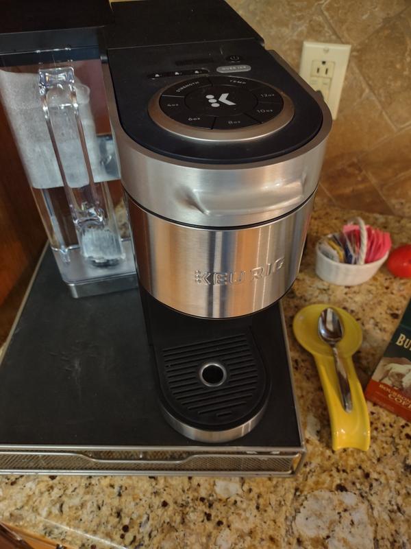 Keurig® Brewer KSupreme Plus Single Serve Coffee Maker in Silver Bed