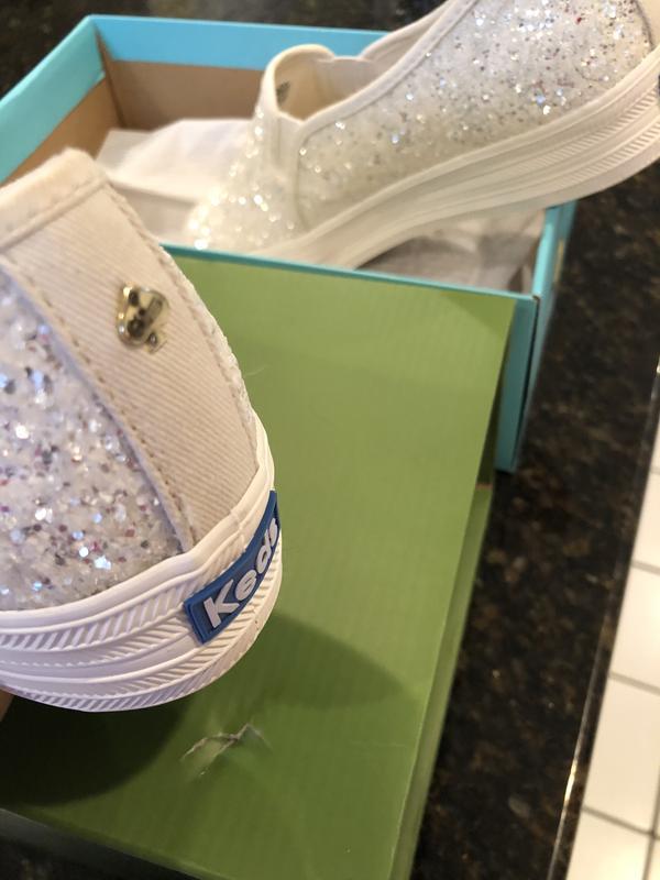 Spade logo damaged, gold finish removed/rusted