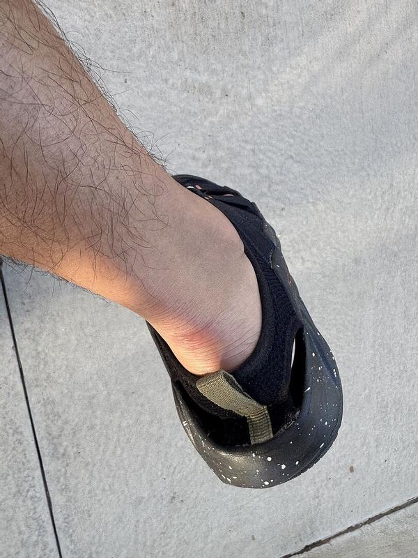 Customer photo for "Don’t buy these shoes. They hurt the back of my fe"