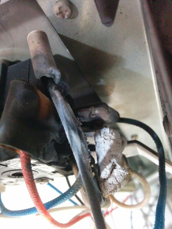 Close-up of melted connectors and burned wires.