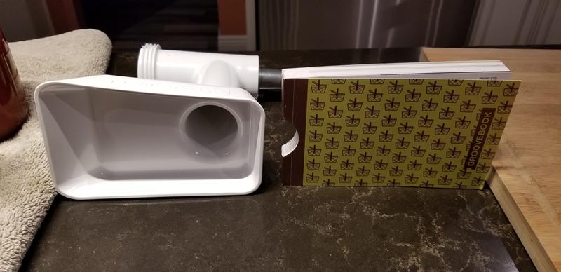 Next to a 4x6 photo book.