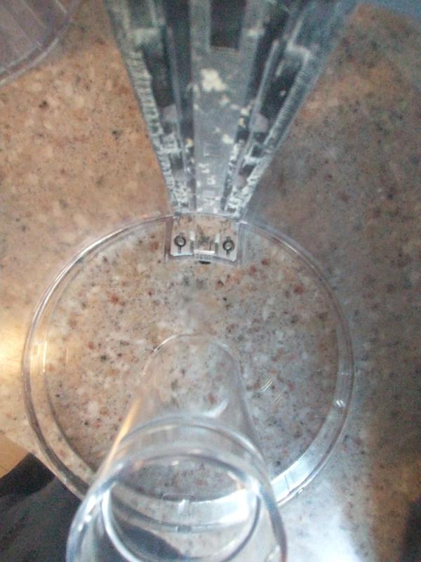 Grime between black plastic handle  and bowl