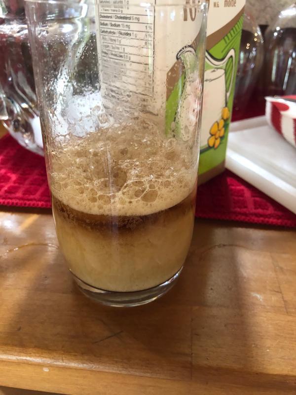 With sparkling water and cream