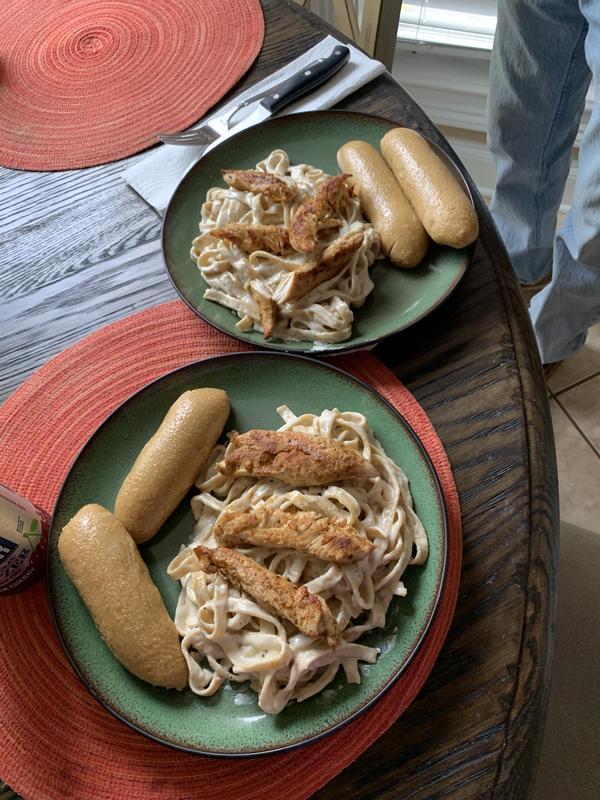 Chicken Alfredo for two, homemade pasta and bread sticks nothing taste better!