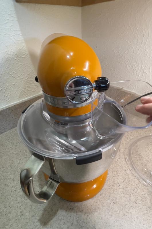 Black grippers hold shield in place