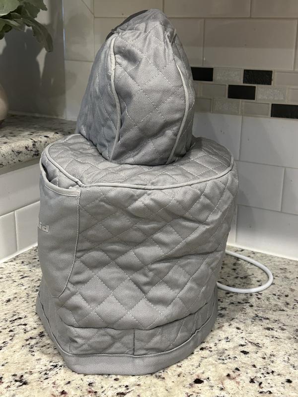 Quilted cover is great.keeps the mixer clean and is good looking too.