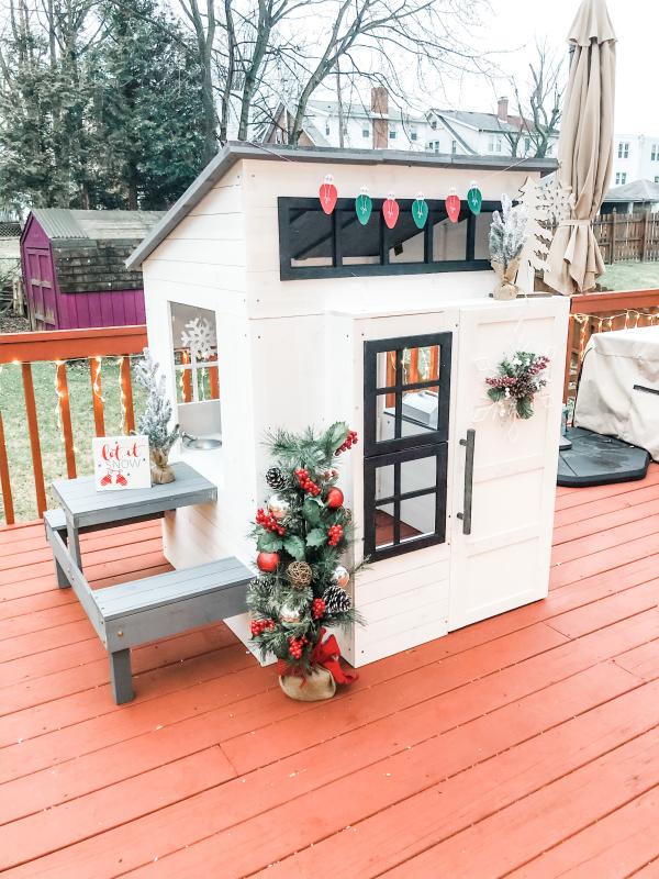 white wooden playhouse