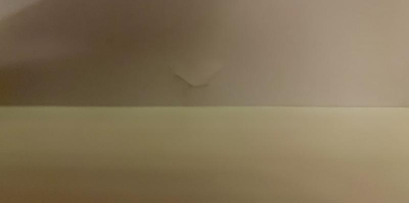 Screw, halfway screwed into correct placement cracking the top of the desk.