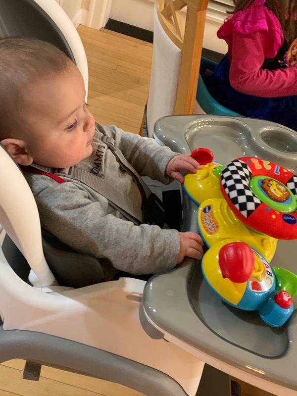 Showing hand distance and incline with seat. Incline helps support babies neck which still needs some support