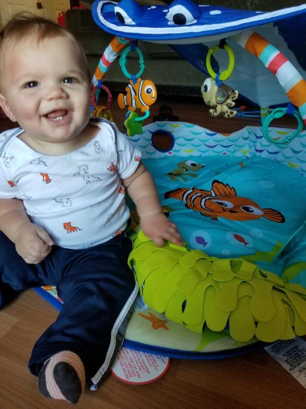 Happy boy with a new fun toy!