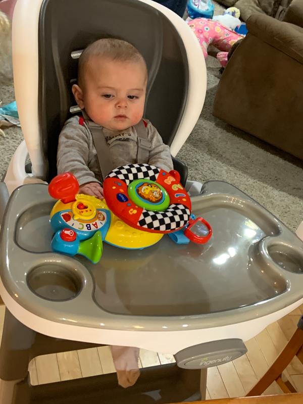 Chair straight up. I little far for toy to set for son to reach but great support with seat belt