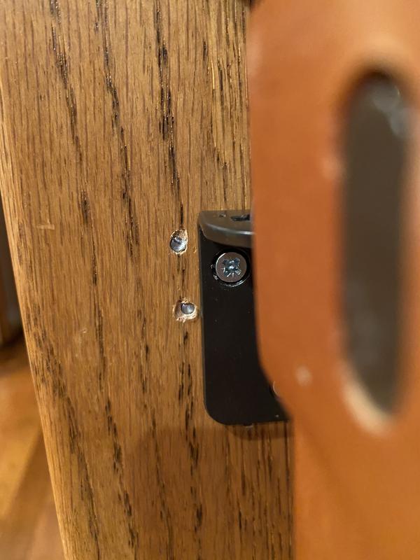 The screws snapped right off and are now stuck in our banister