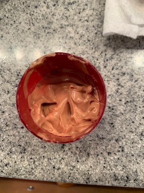 After cutting container in half.  Amazing how much is left that will NOT pump out.