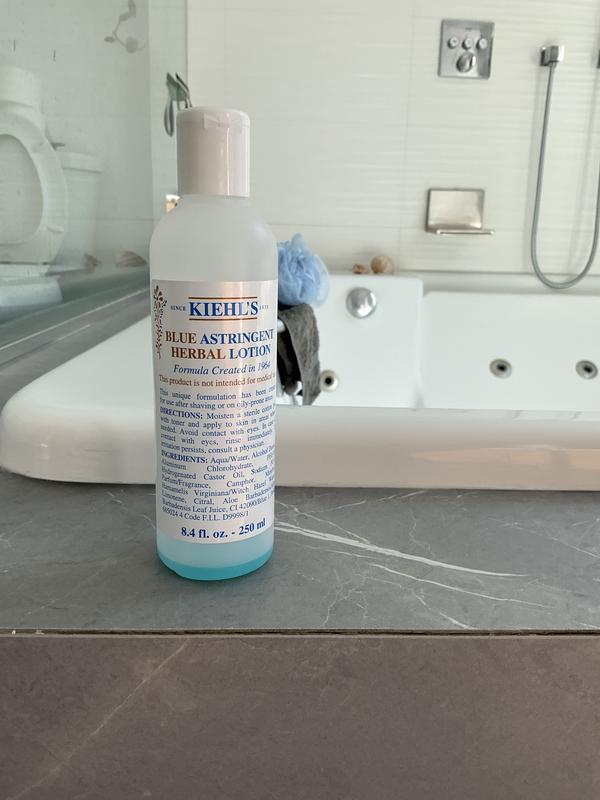 Empty Blue Lotion Bottle