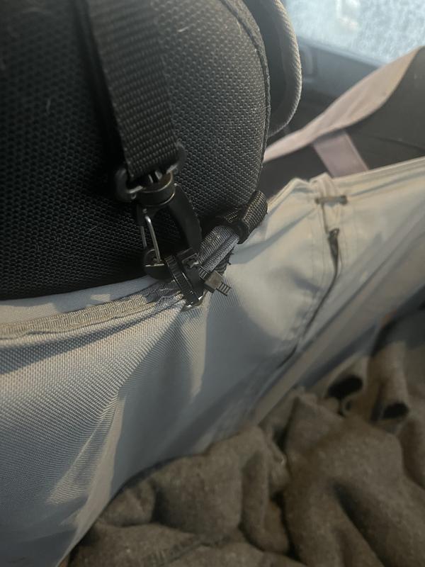 Additional broken grommet loop replaced with zip tie