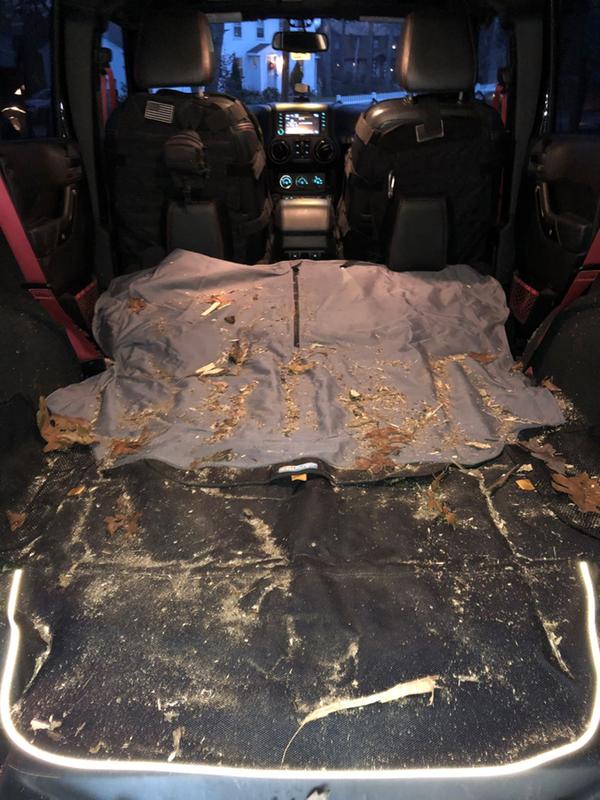 Cargo cover with seat down, just remove the straps and shake it out. No need to vacuum!