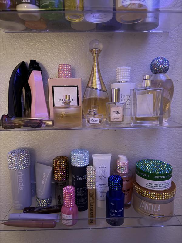 I bedazzled mine, if you can see it on the middle shelf right hand side.