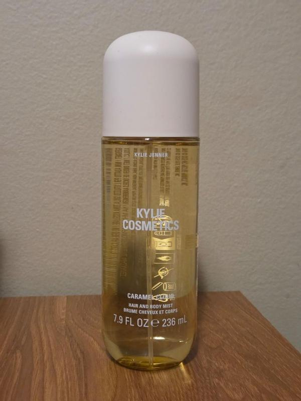 Customer photo for "Super cozy caramel scent that feels light in hair and skin"