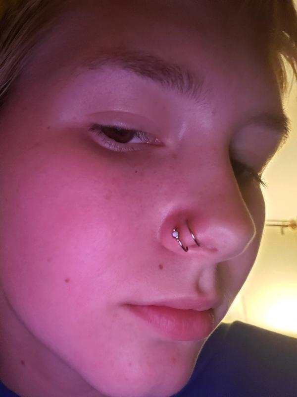 Septum correction! On the right is what this client came to me with,  jewelry is a 3/8 mystery metal. On the left- the new piercing! Jewelry is  the same exact size- some