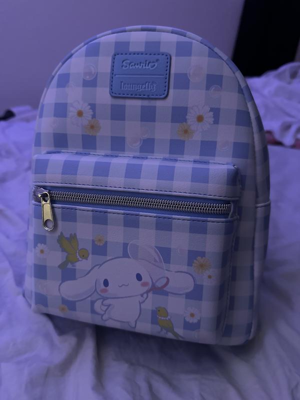 calvin klein jeans logo backpack in mini Calvin Klein Logo Denim Mini Flap Backpack - Light Denim Wash
