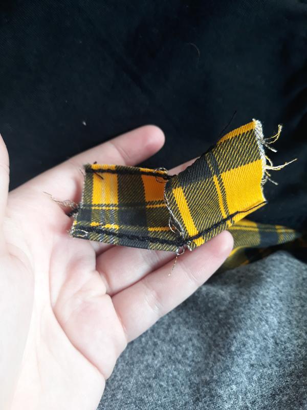 Half yellow plaid half black outlet pants