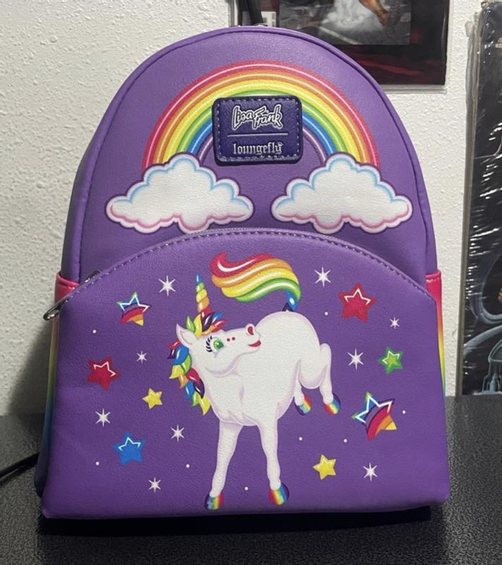 Loungefly - 🌈Time to live your rainbow dreams with a giveaway from  #SummerofLoungefly! 🌈 Head to Instagram to enter for a chance to win this Loungefly  Lisa Frank Iridescent mini backpack