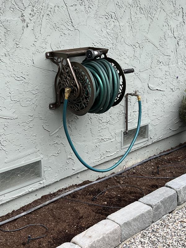 Have a question about Hampton Bay Wall-Mounted Hose Reel? - Pg 5