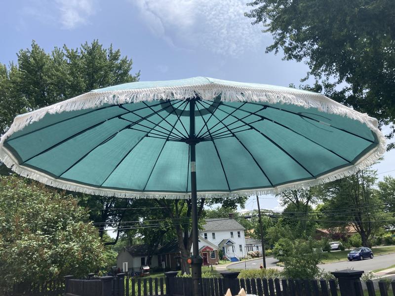 dark or light colored patio umbrella HOOOWOOO Extra-Large 8.5 x 14.5 ft. Rectangular Patio Umbrella with Colorful Solar Light, Steel Stand and Sand Bags in Dark Blue