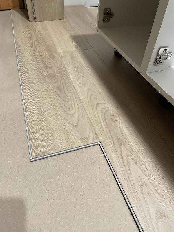 reDefine Cocoa Twilight 22 MIL 7 in. W x 48 in. L Waterproof Click Lock Vinyl Tile Flooring (23.64 sq. ft./ctn)