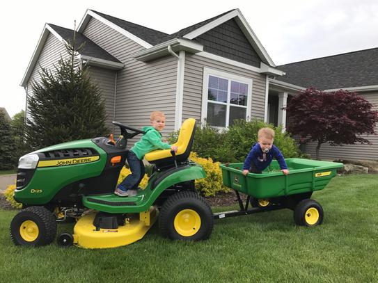 John Deere 450 lb. 7 cu. ft. Tow Behind Poly Utility Cart Dump Trailer with  Universal Hitch LP21935 - The Home Depot