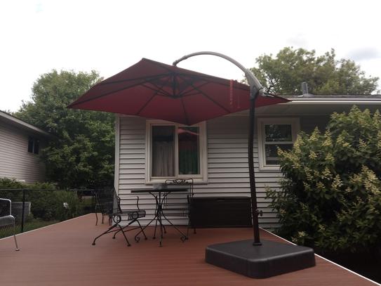 fabric spray paint for patio umbrella How to Paint a Faded Outdoor Umbrella (+ Updates on How it Lasted!)