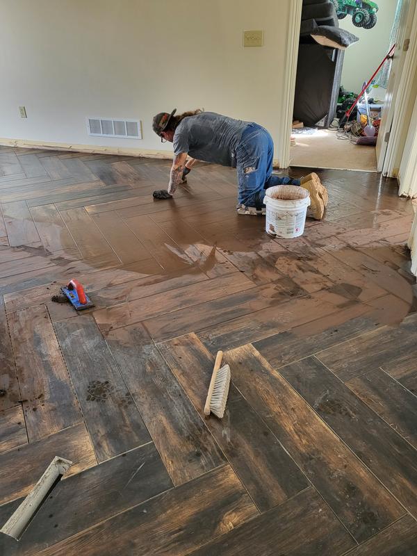Florida Tile Home Collection Smoked Hickory 8 in. x 36 in. Porcelain Floor and Wall Tile